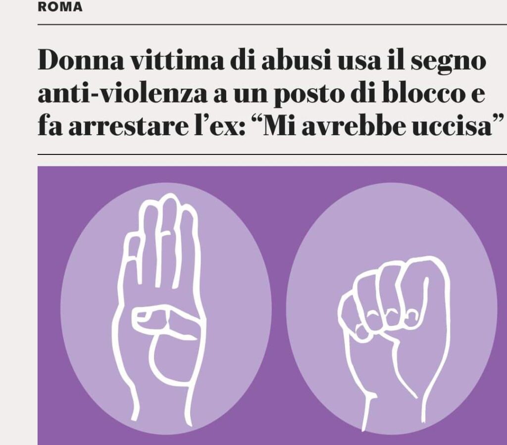 Donna vittima di abusi usa il segno anti-violenza ad un posto di blocco